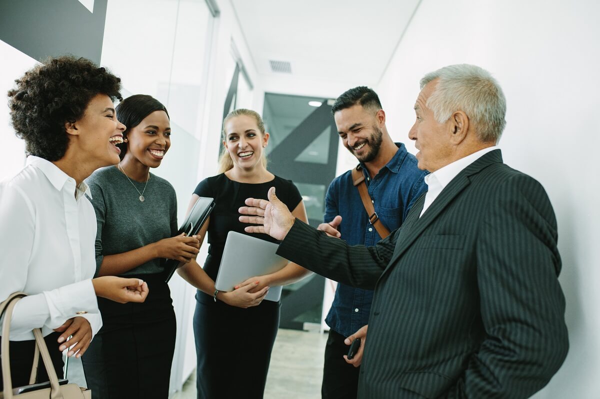 Group of professionals talking to each other