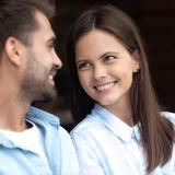 Young couple smiling and looking at each other 