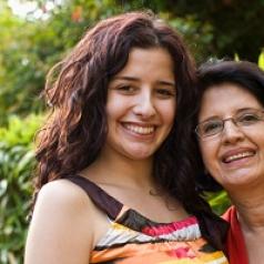 Woman and her mother smiling