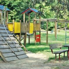 An inviting playground is shown on a sunny day.