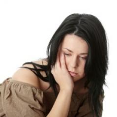 Young corpulent woman with depression