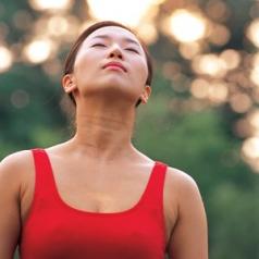 woman outside doing mindfulness exercising