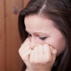 young-woman-crying-outside-050814