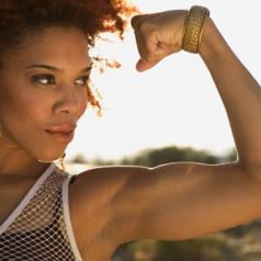 strong woman flexing bicep
