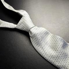 Elegant gray tie on a black