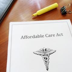 A copy of the Affordable Care Act on a desk