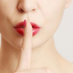 Finger on lips - silent gesture