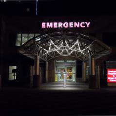 Emergency room sign at night