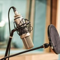Microphone and pop filter in recording studio