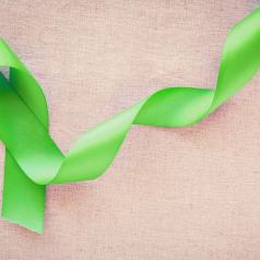 Lime green ribbon for Mental Health Awareness Month
